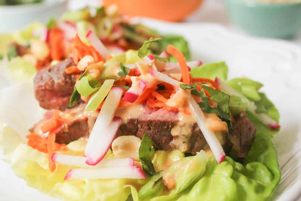 Lettuce wraps with five spice flank steak and peanut sauce