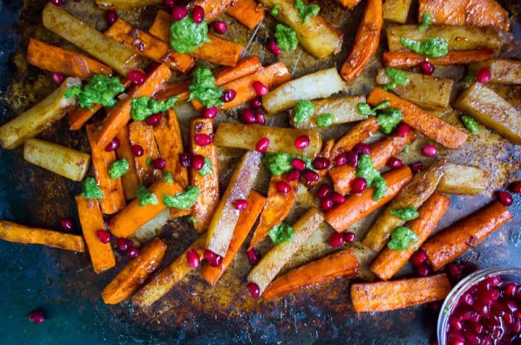 tzimmes with tahini pesto and pomegranate